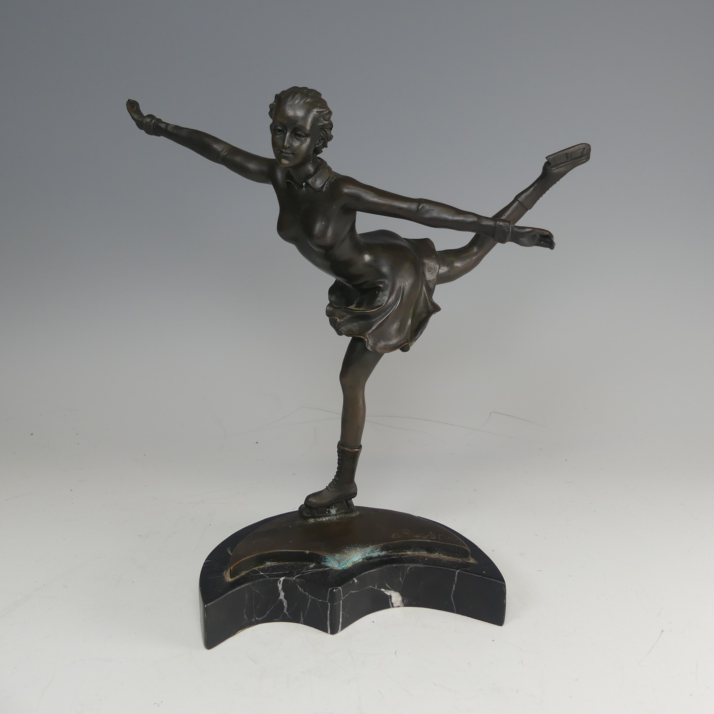 An Art Deco style bronze and resin Figure of a young girl skating, signed 'Preifs', mounted upon