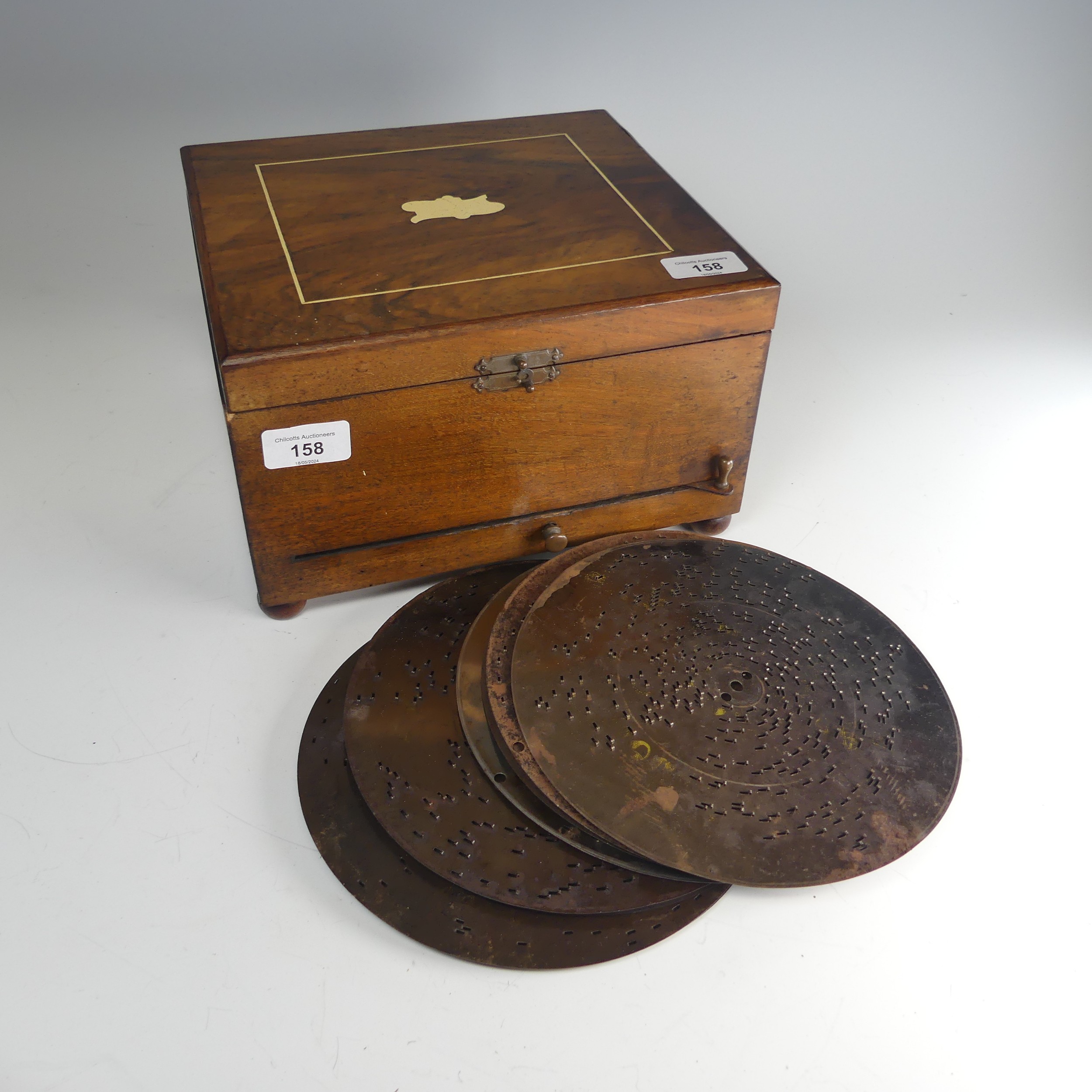 A late 19th century walnut cased Polyphon, with decorative hinged lid, the inside lid with - Image 4 of 6
