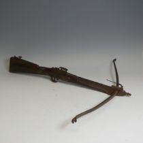 An antique probably late 18th/early 19th century Crossbow, with wooden stock and textured grip,