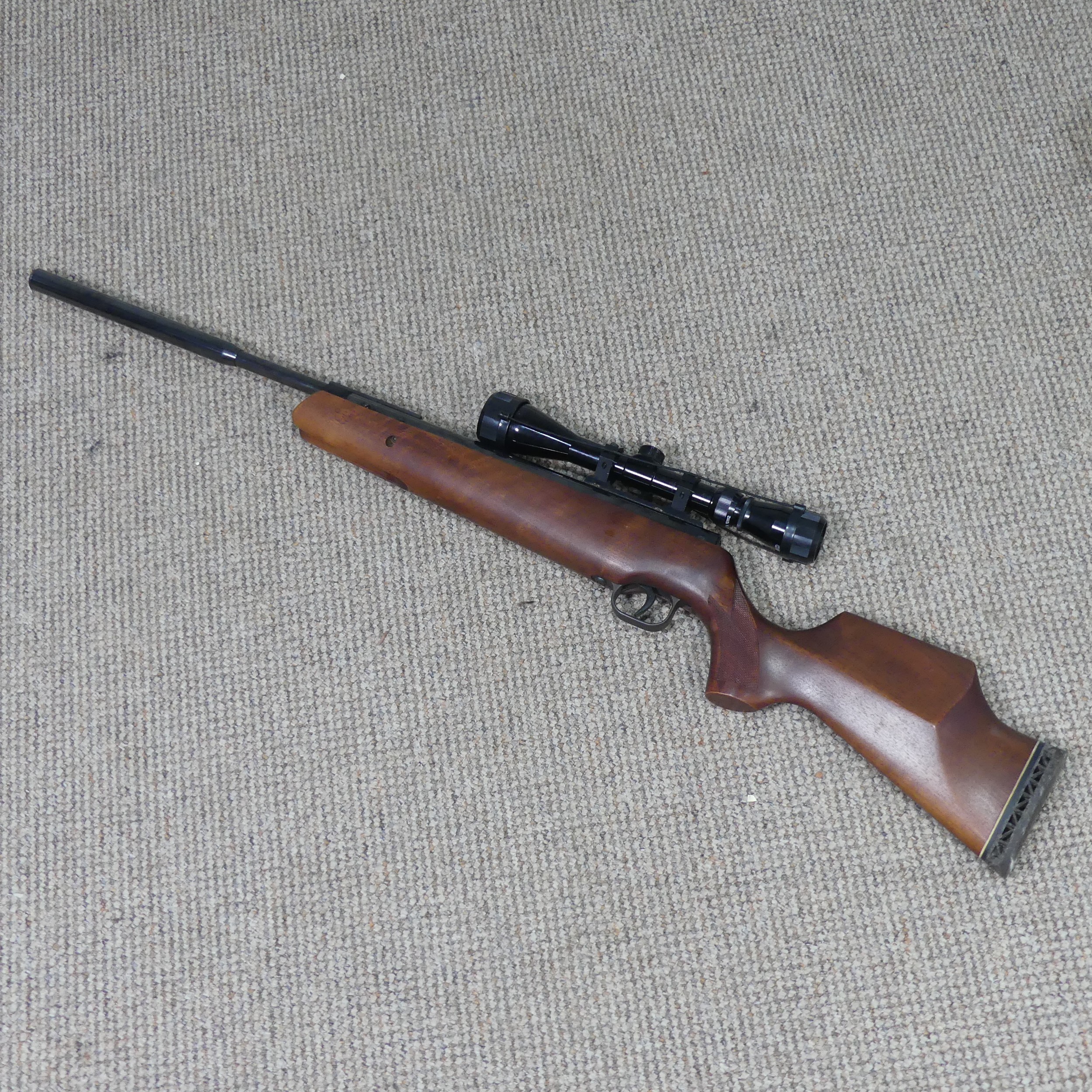 A Theoben H-E .22 CAL Air Rifle, complete with Tasco scope (3-12x40).