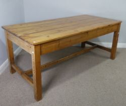 An early 20th century pitch pine Farmhouse Kitchen refectory Table, six planked top raised on square