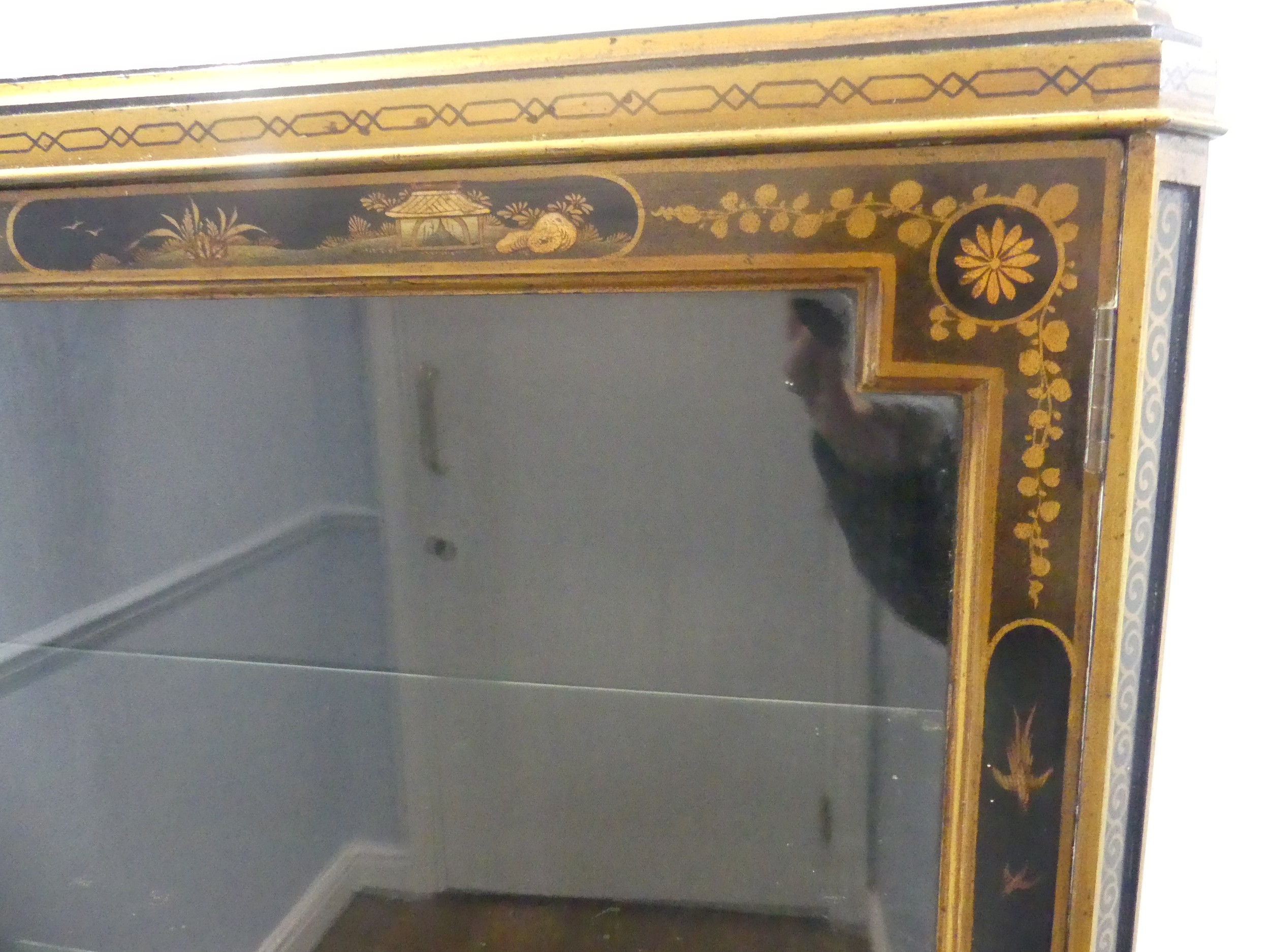 An early 20th century Chinoiserie display Cabinet, black lacquered with gilt painted decorations, - Image 6 of 7