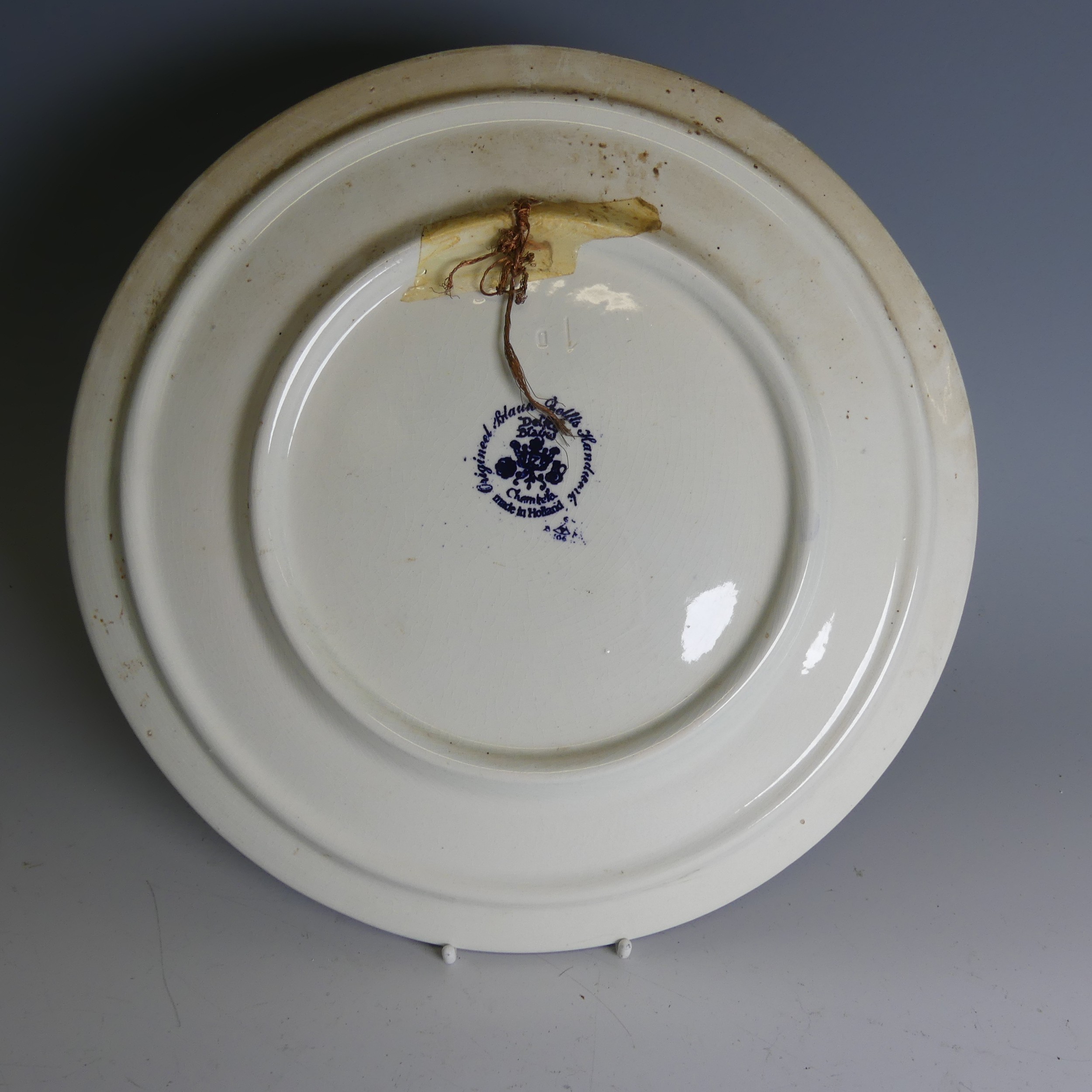 A pair of De Porceleyne Fles Delft pottery Plates, of moulded form, decorated with birds amongst - Image 6 of 10