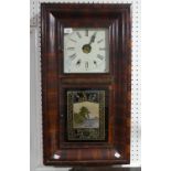 A late 19th century American Wall Clock, manufactured by 'Jerome & Co', W 42 cm x H 76 cm x D 11 cm.