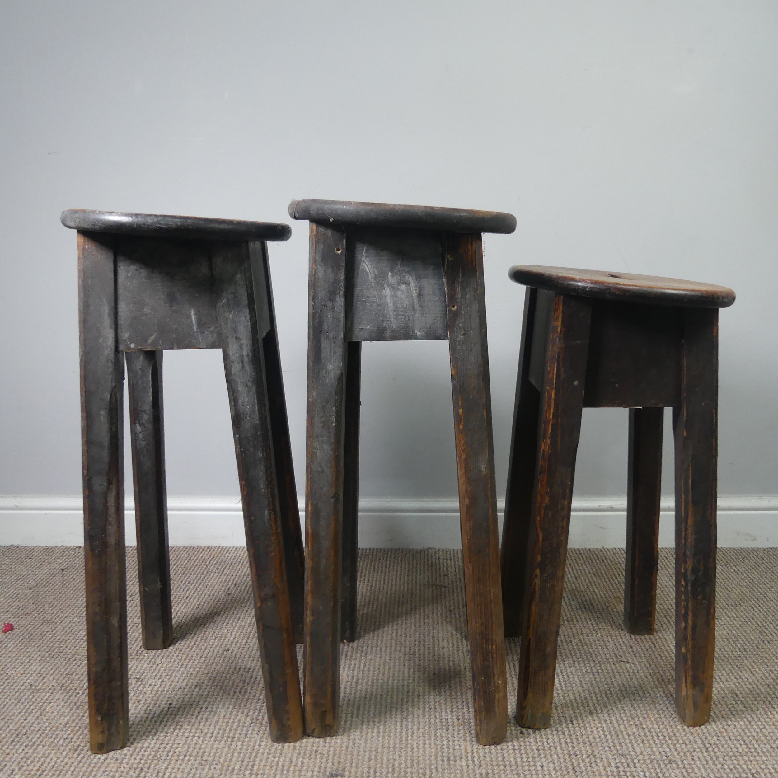 Three antique stained pine kitchen Stools, with oval tops and pierced handles, raised on chamfered - Image 4 of 4