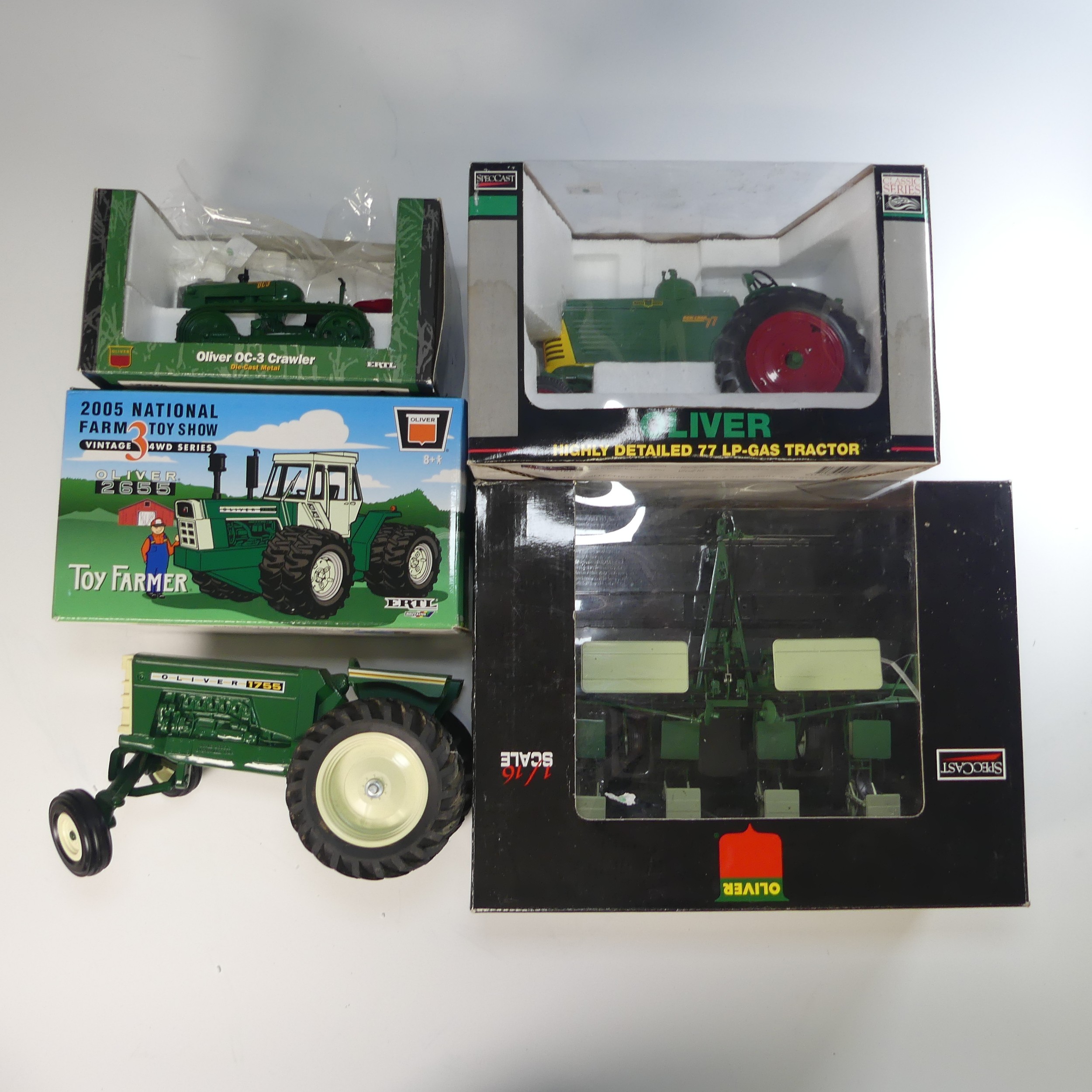 A Speccast Oliver 77 LP-Gas Tractor 1/16 scale in original box, together with a Speccast 540 row