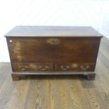 An early Georgian oak mule Chest, rectangular top over two drawers raised on bracket feet, W 124