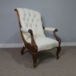 A Victorian mahogany open Armchair, upholstered button back and scroll arms, above serpentine