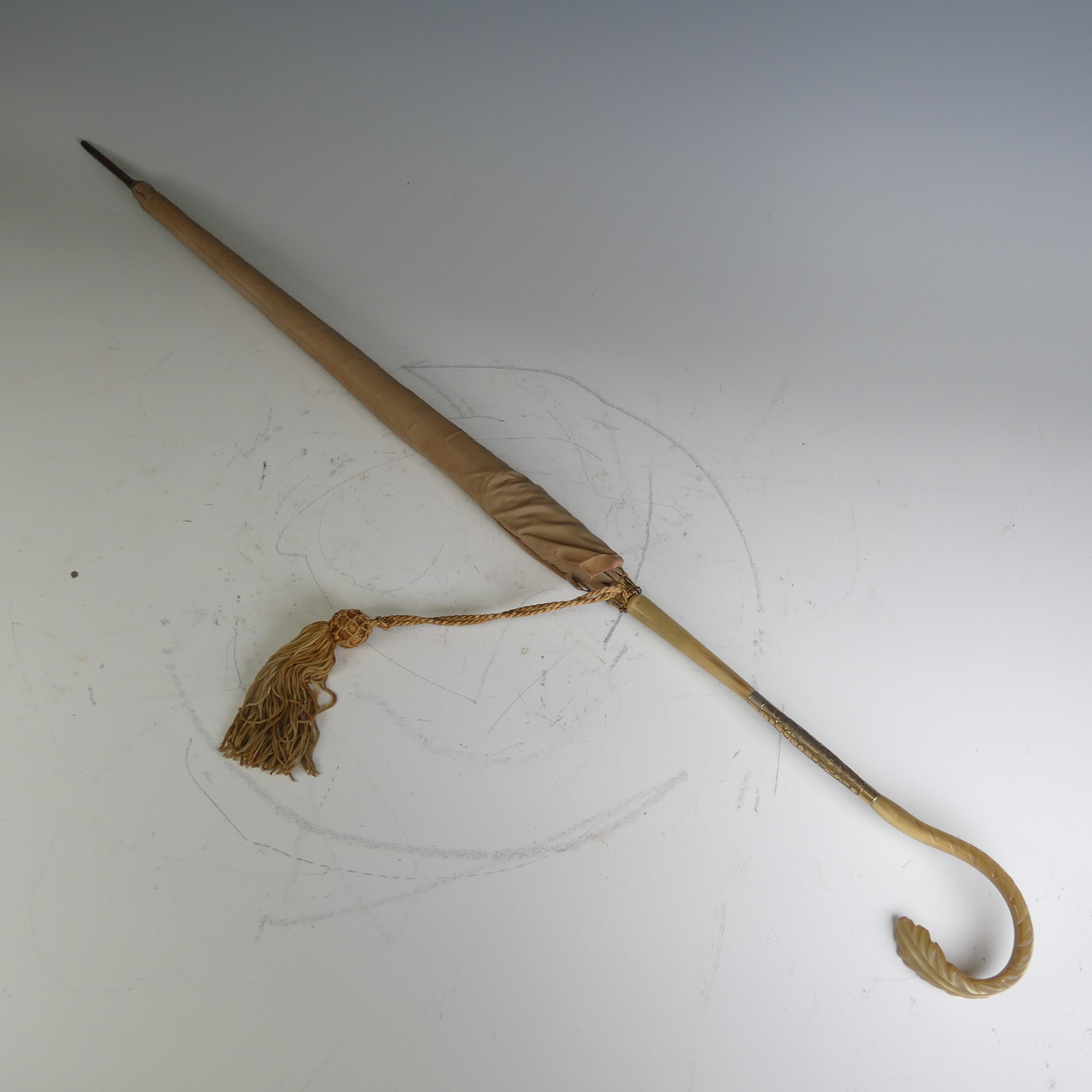 An early 20th century horn handled Parasol, by S. Fox & co stamped 'Paragon', carved horn handle and