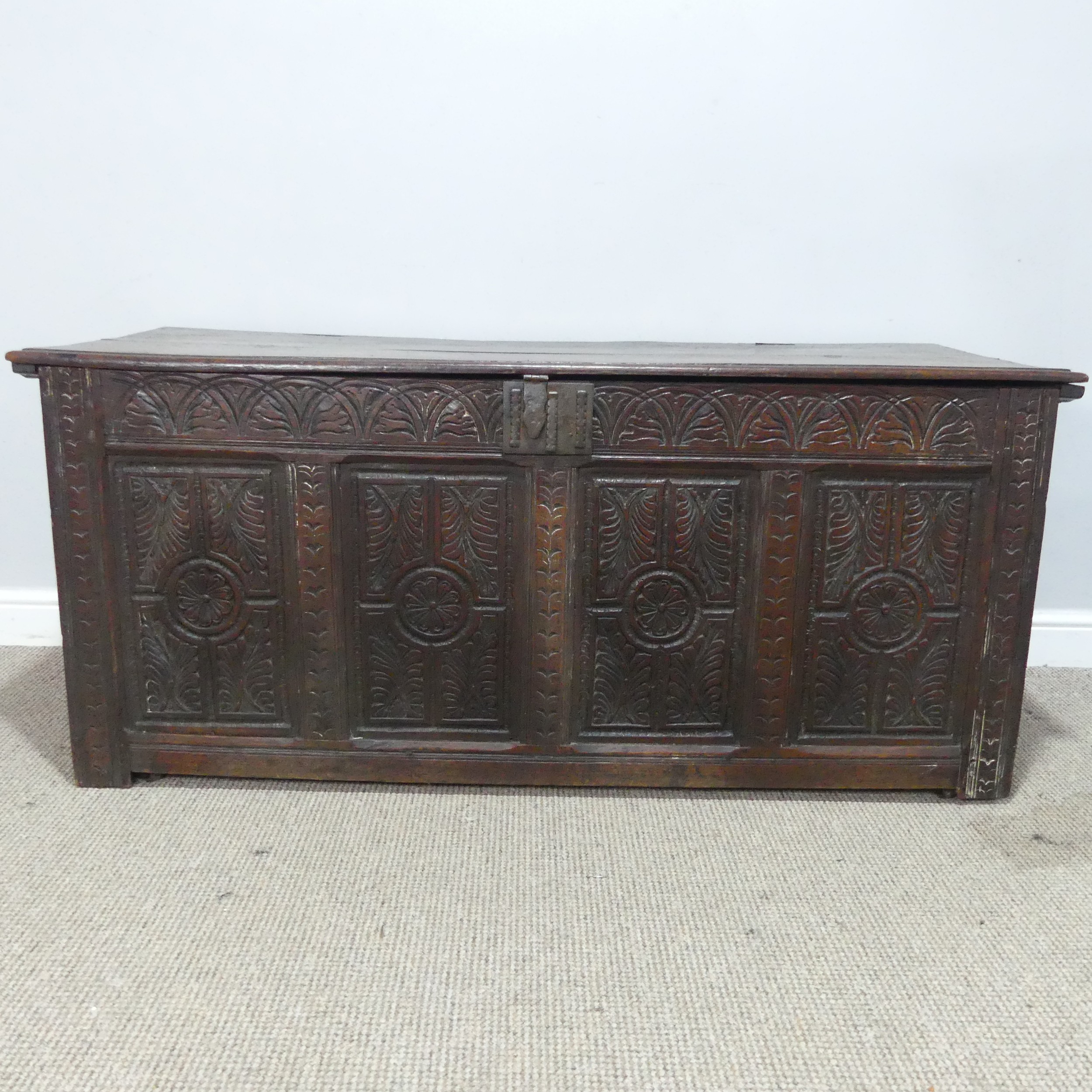 A 17th century and later oak Coffer, rectangular plank top over 17th century carved panels, raised - Bild 2 aus 11