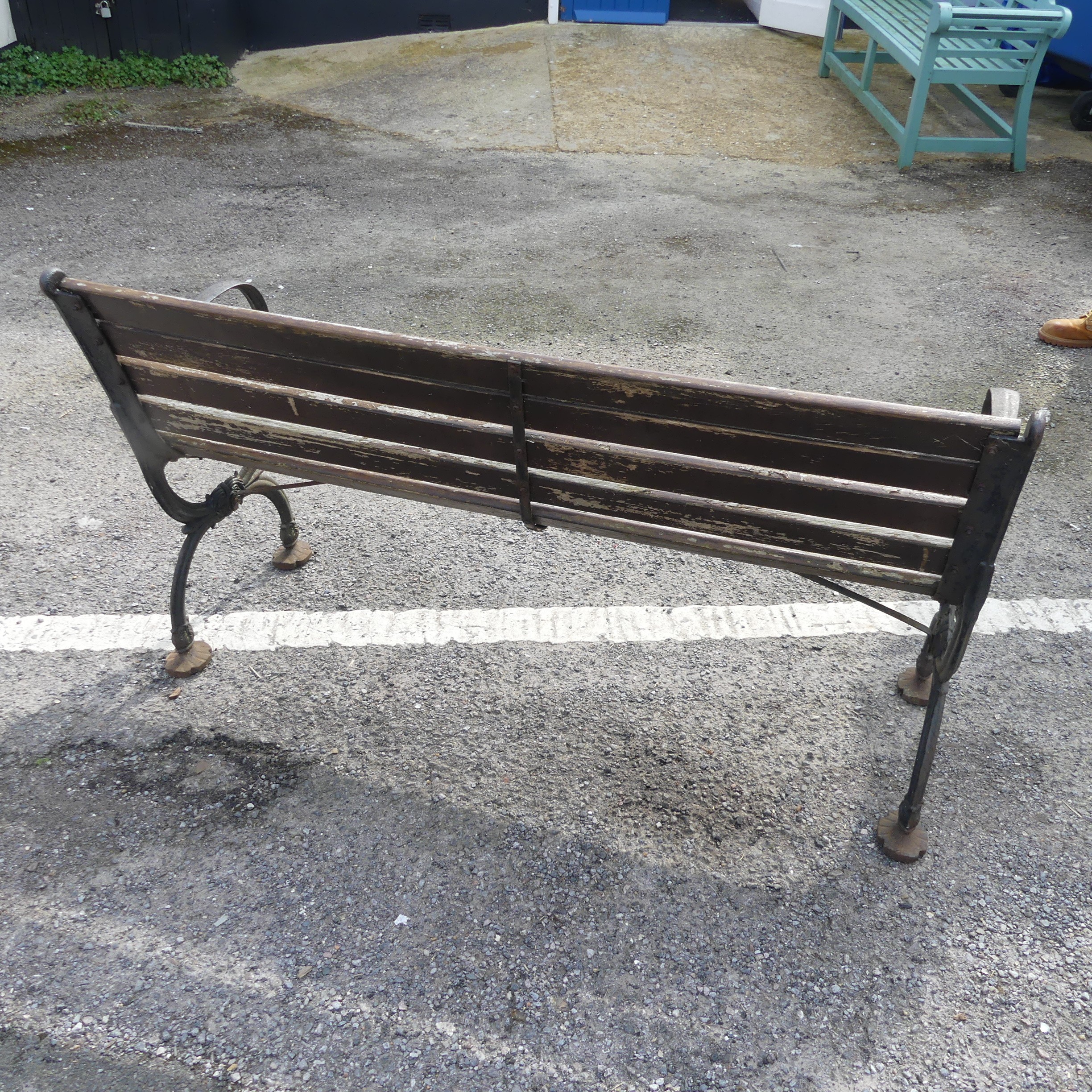 An antique cast iron and teak Garden Seat /Bench, with scrolled supports, W 129.5 cm x H 74 cm x D - Image 5 of 5