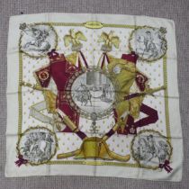 A Hermès jacquard silk scarf: 'Napoleon', designed by Philippe Ledoux, first issued in 1963,