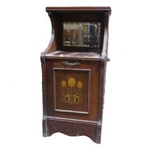 An Edwardian mahogany Purdonium, with Art Nouveau inspired stylised floral inlay to panelled door,