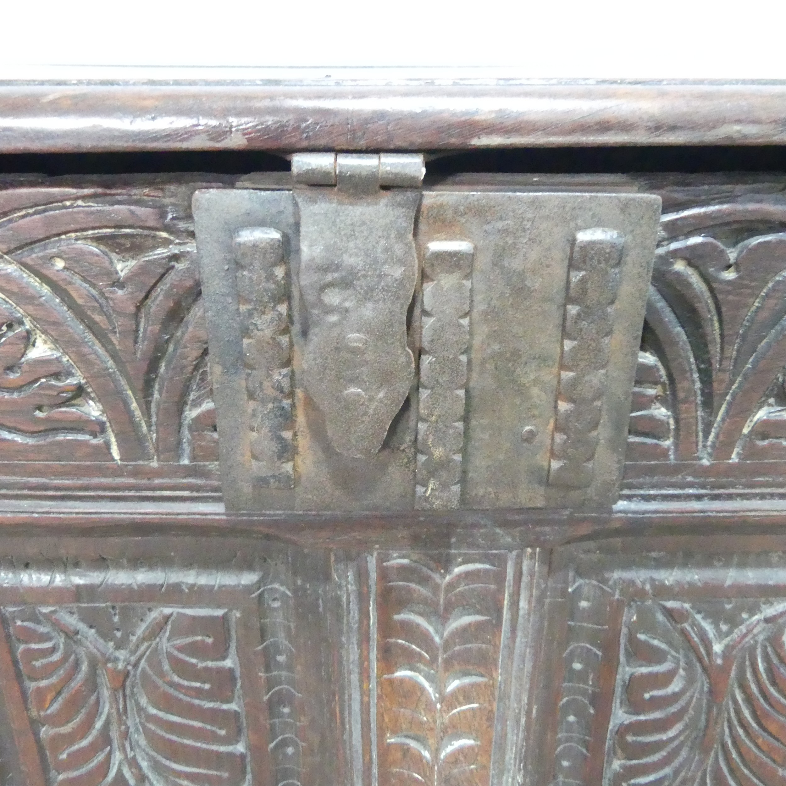 A 17th century and later oak Coffer, rectangular plank top over 17th century carved panels, raised - Bild 3 aus 11