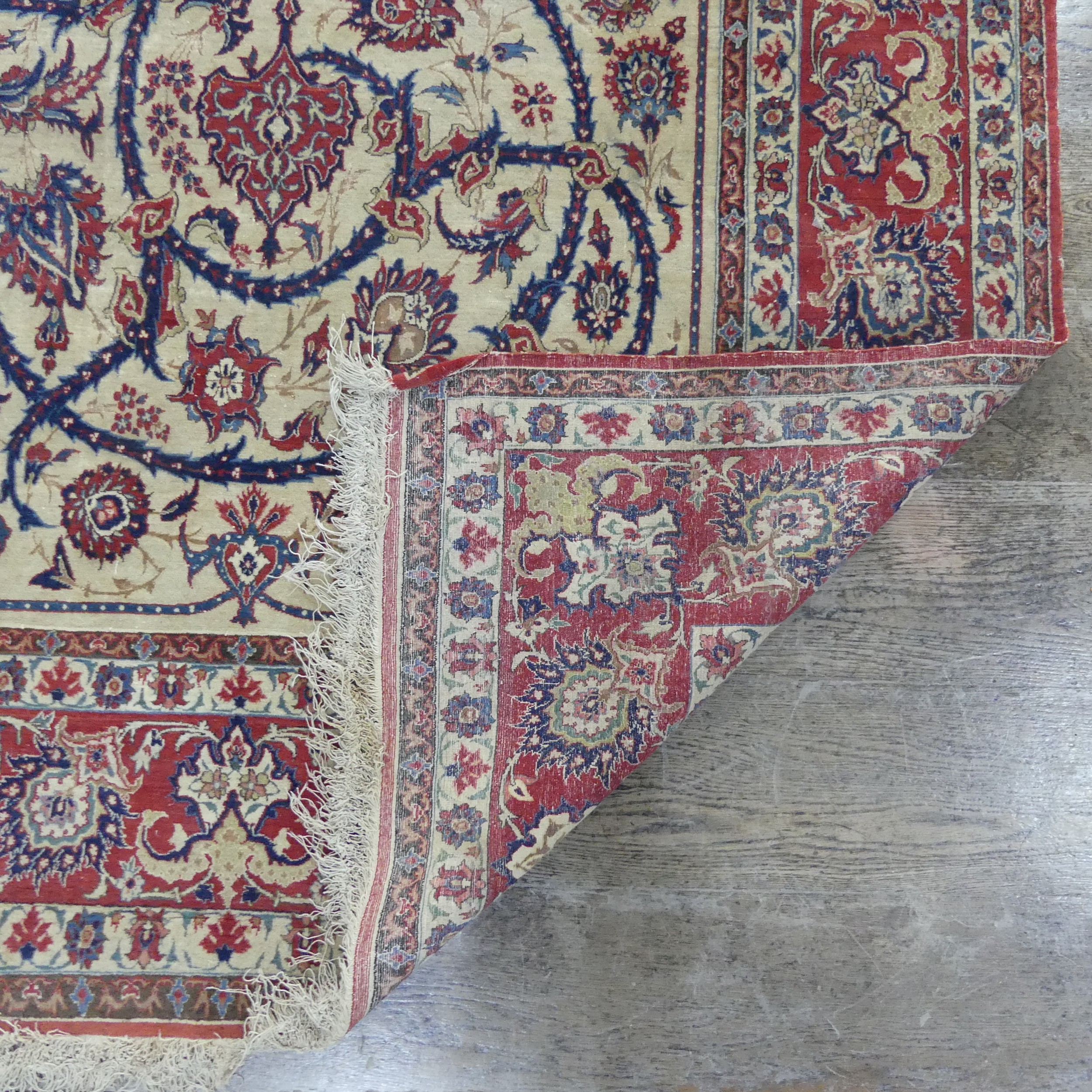 Tribal Rugs; a finely hand-knotted old Isfahan silk rug, of classic design, the cream ground woven - Image 3 of 5