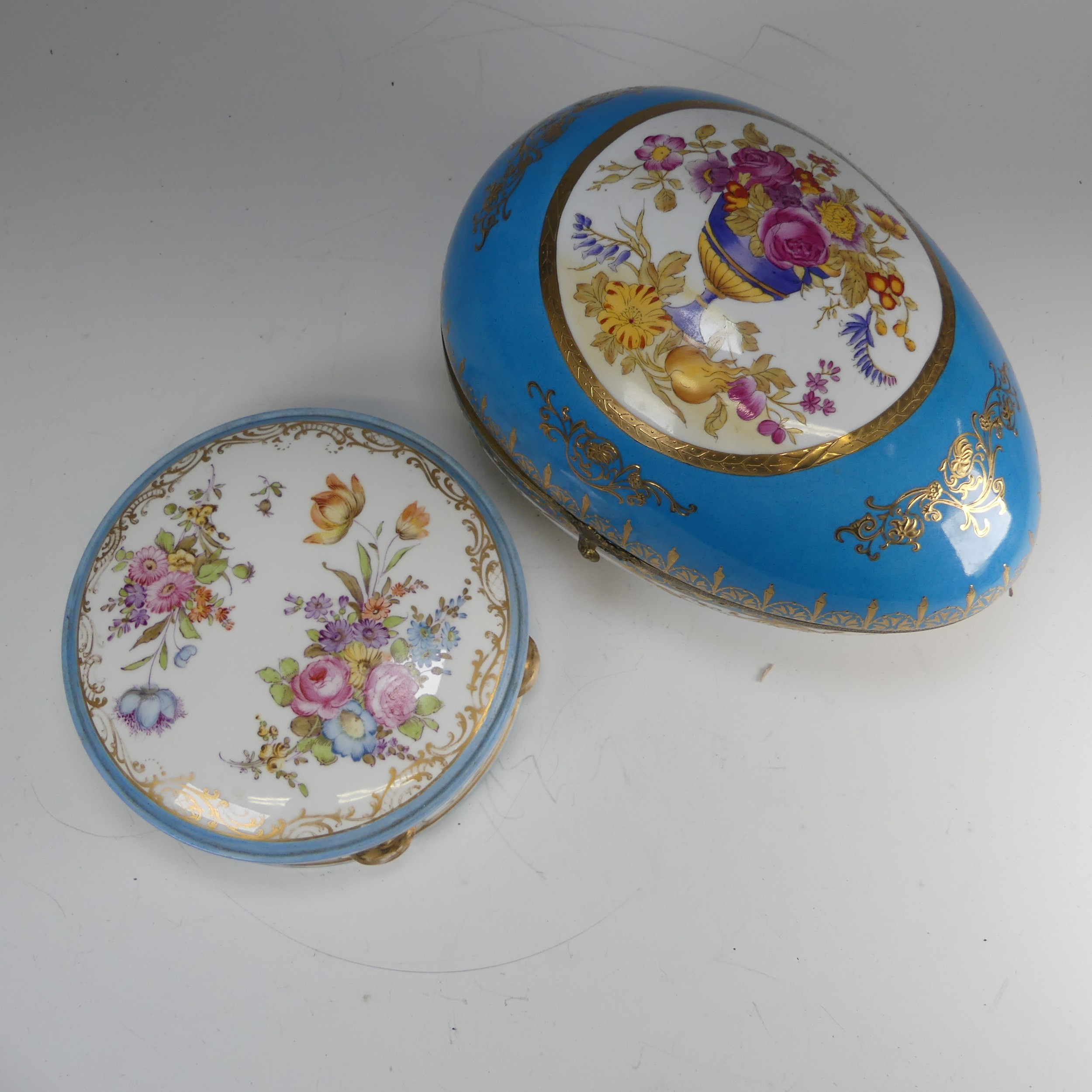 A continental porcelain Sevres style egg shaped Box, blue ground with gilt metal mount, decorated - Image 2 of 7