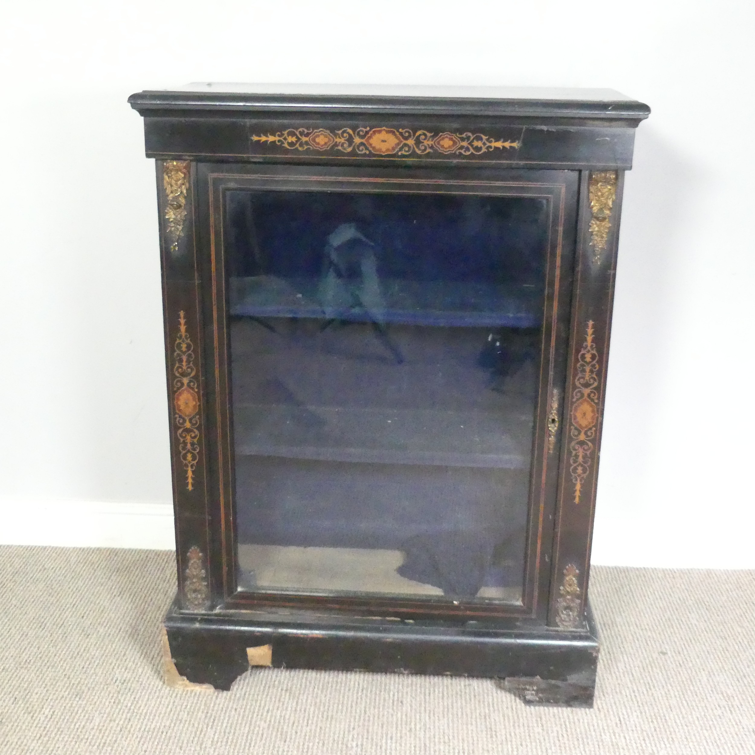 A Victorian ebonised and marquetry glazed Pier Cabinet, top over inlaid frieze and glazed cupboard