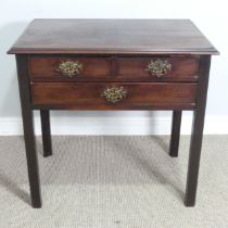 A Georgian oak Lowboy, shaped top over three drawers and square canted legs, W 75.5 cm x H 71 cm x D