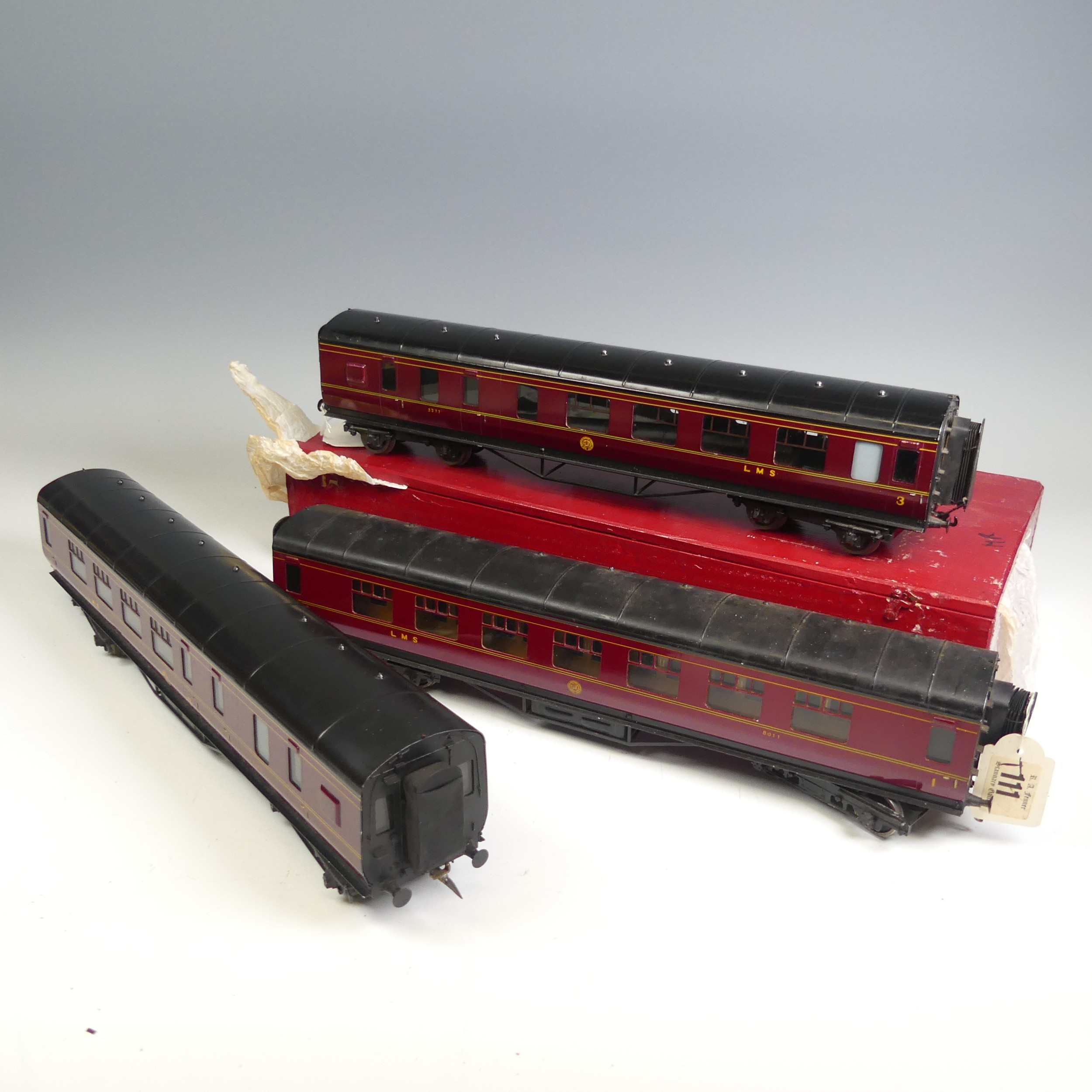 Three Exley ‘0’ gauge LMS Passenger Coaches, maroon with yellow lettering; 1st Class Corridor