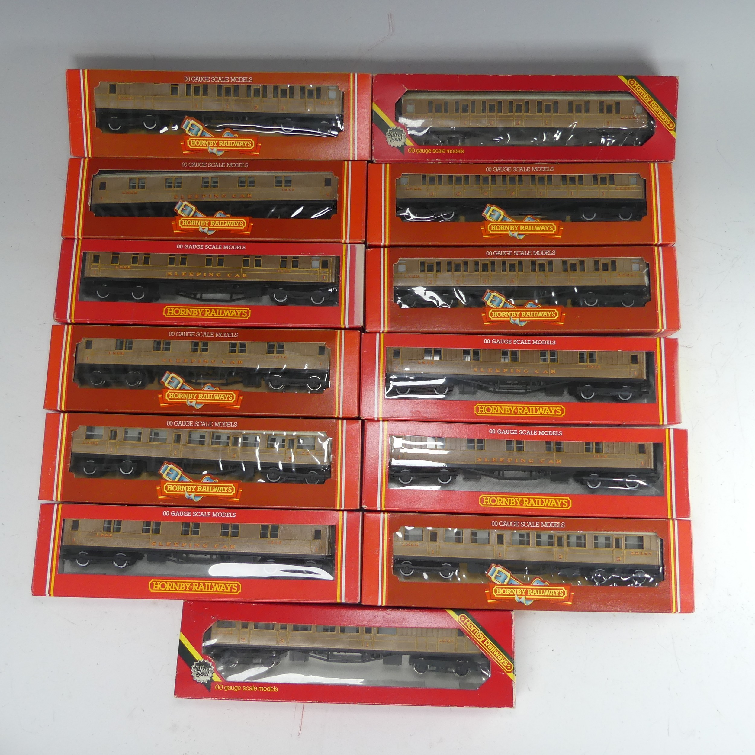 Hornby Railways: Thirteen ‘00’ gauge LNER Passenger Coaches, teak finish, including 4 x R.413 1st