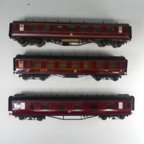 Six ‘0’ gauge LMS bogie Passenger Coaches, possibly Exley or similar, in LMS maroon with yellow