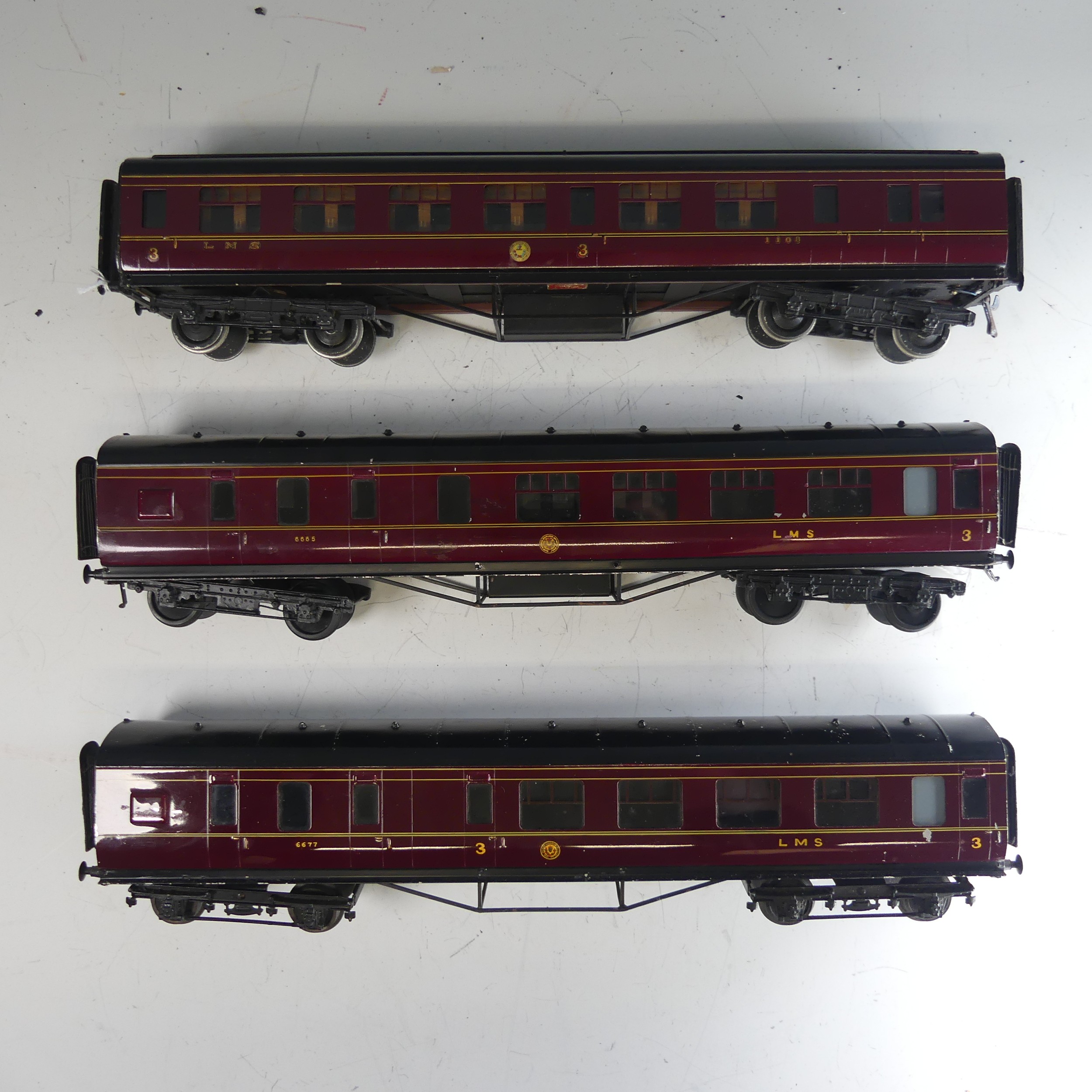 Three Exley ‘0’ gauge LMS 3rd Class Corridor End Brake Coaches, maroon with yellow lettering, No.