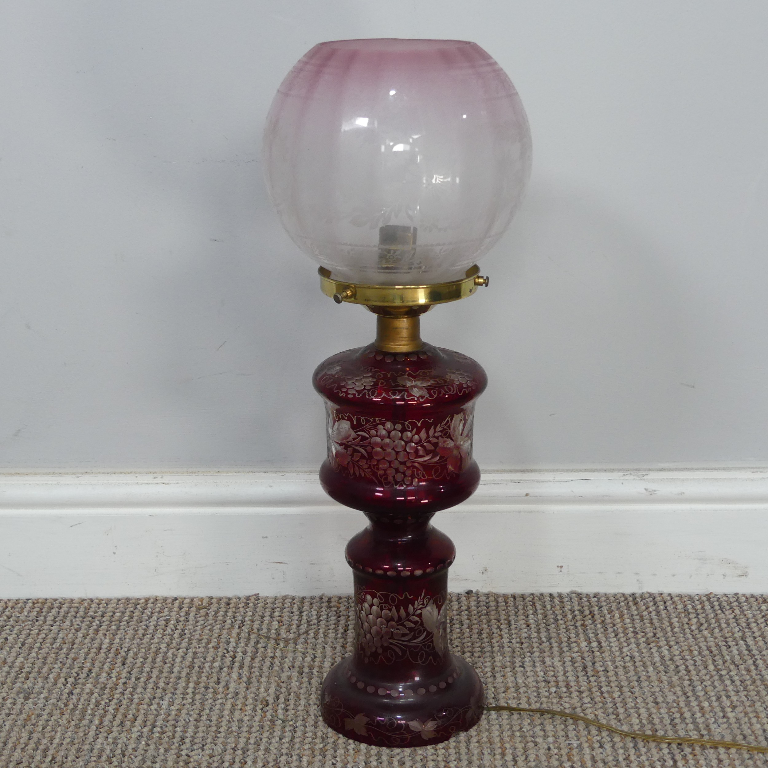 An antique ruby glass electrified Oil Lamp, with etched glass shade, H 49 cm, together with two - Image 3 of 6