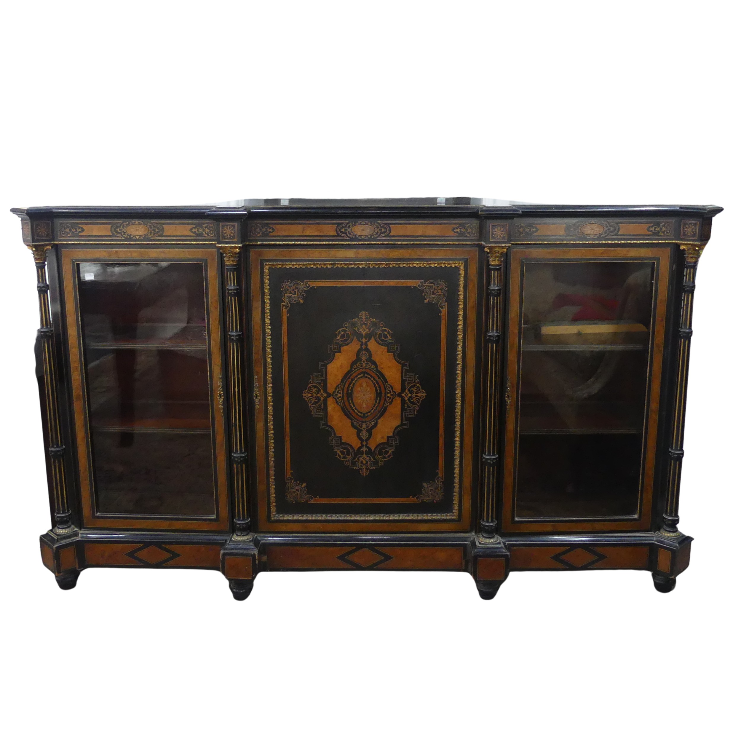 A good Victorian ebonised, marquetry and walnut banded breakfront Credenza, shaped top above