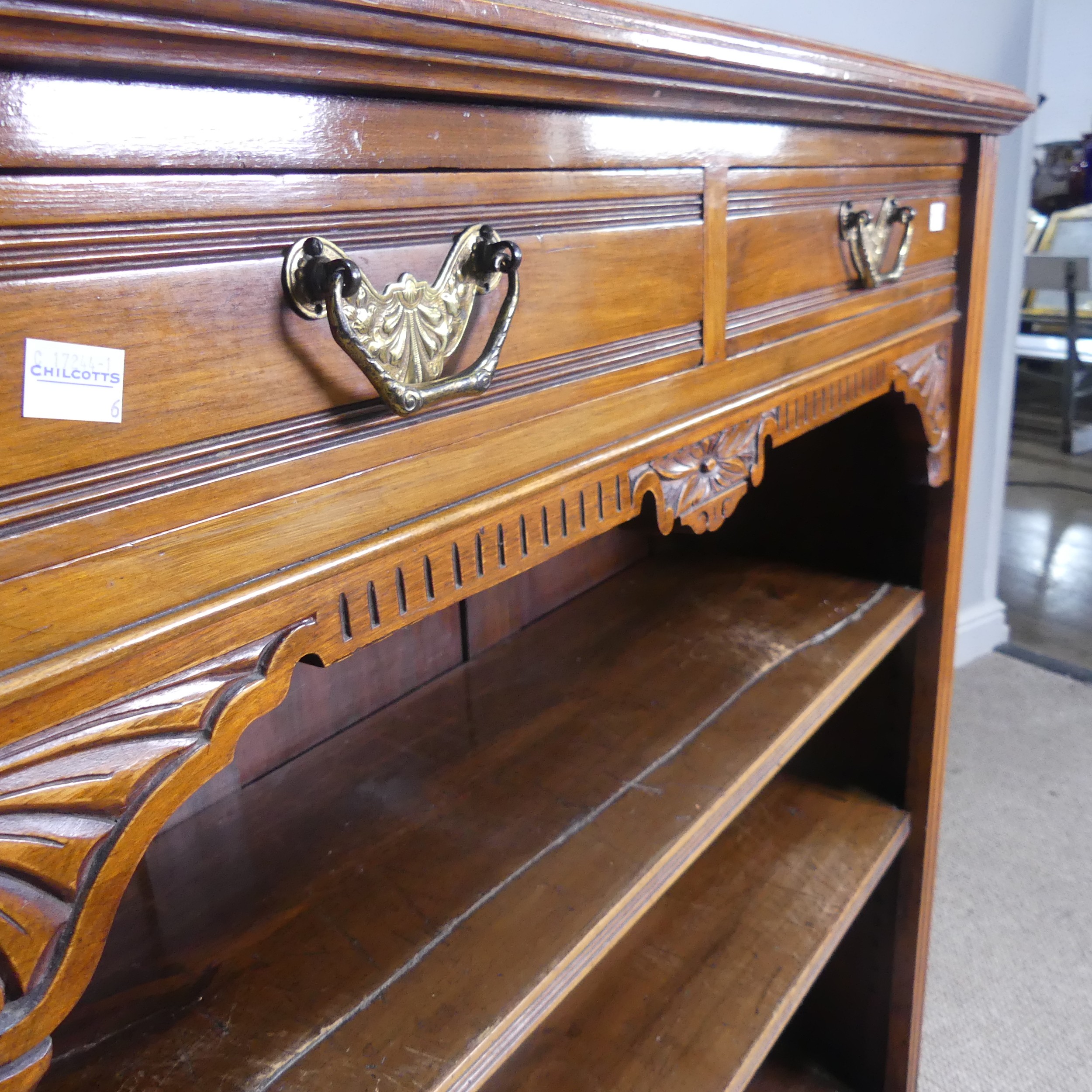 An Edwardian mahogany open Bookcase, two short frieze drawers over two open shelves, raised on - Image 2 of 4