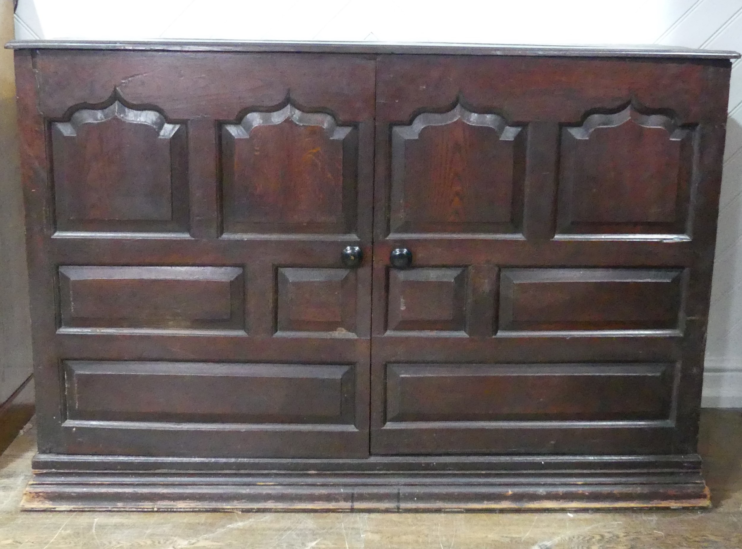 A large 18th century oak panelled Cupboard, raised on moulded plinth base, W 141 cm x H 95 cm x D 60