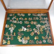 A large quantity of approximately 250 WW1, WW2 and later Cap Badges, including ; 60th King's Royal
