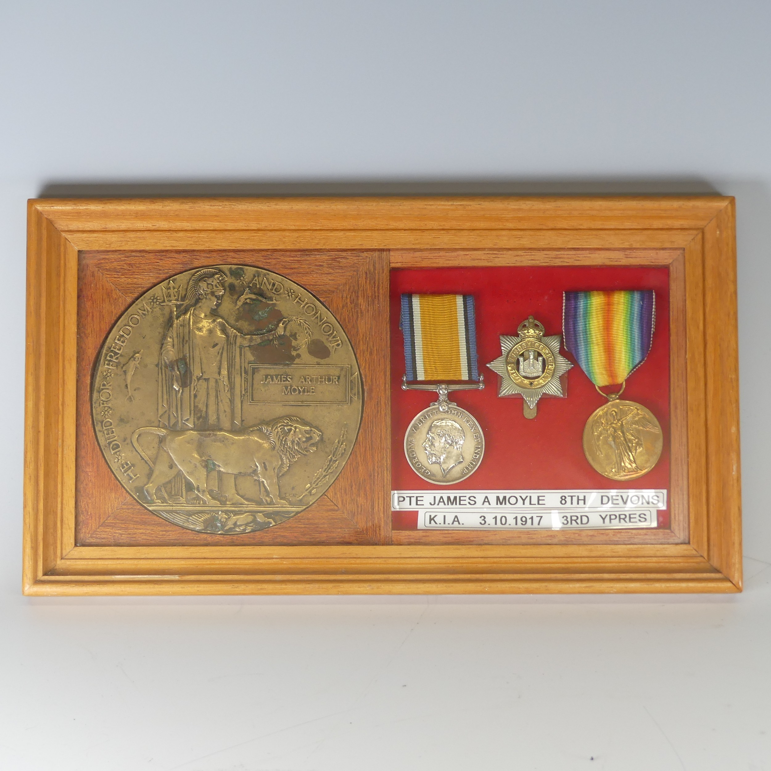 A WW1 Devonshire memorial Plaque 'Death Penny', awarded to the family of 'James Arthur Moyle' K.I.A. - Image 2 of 3