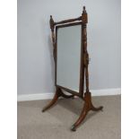 An antique Regency style mahogany Cheval Mirror, rectangular mirror plate, with ring turned supports