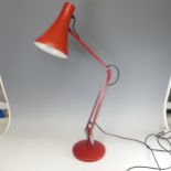 A red Anglepoise desktop Lamp, shade inscribed for Anglepoise, together with a quantity of brass,