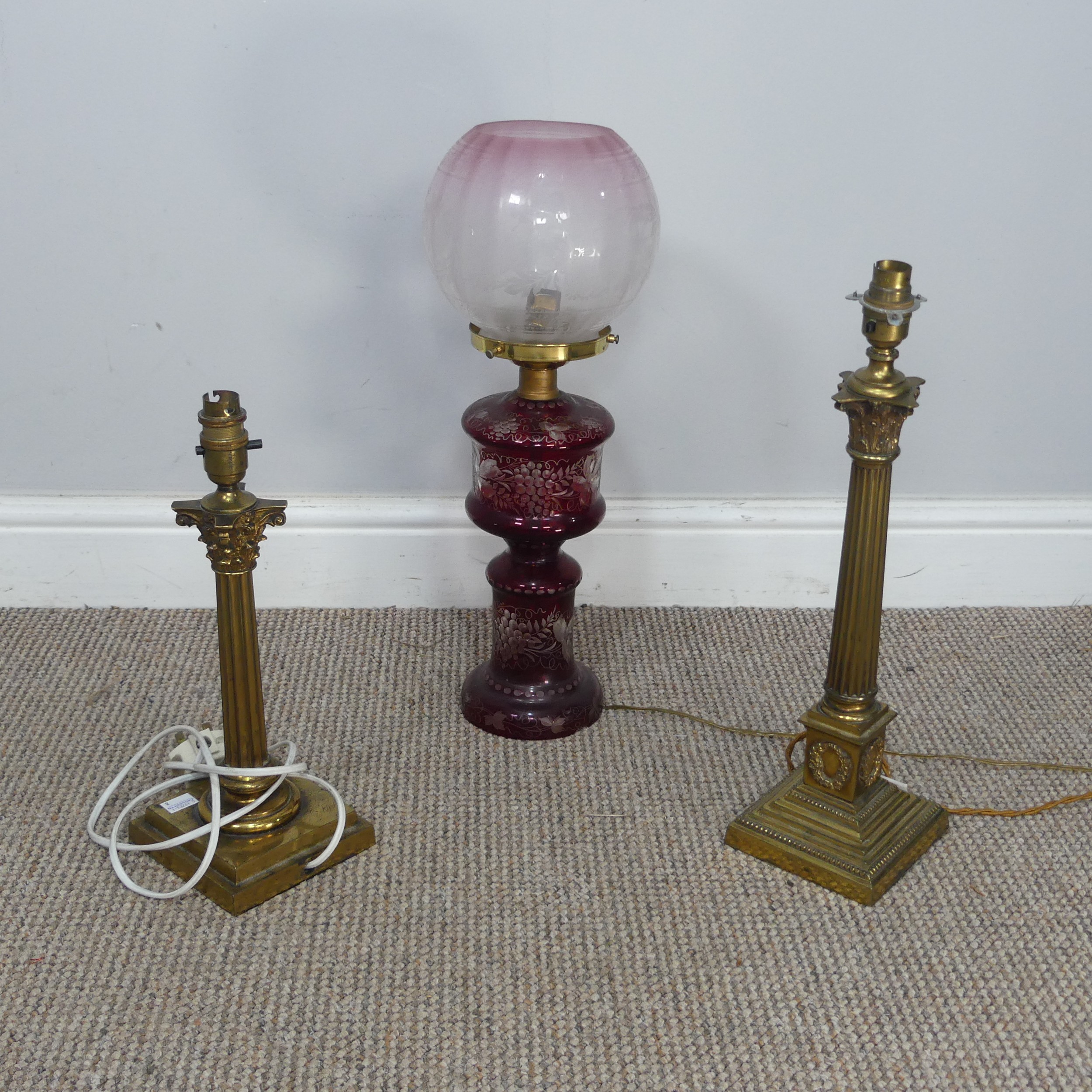An antique ruby glass electrified Oil Lamp, with etched glass shade, H 49 cm, together with two - Image 5 of 6