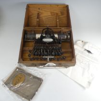 An antique American Blickensderfer No 5 Typewriter, in oak Box, with plaque 'No 5, Blickensderfer,