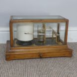 An early 20th century Barograph, the oak case with bevelled glass and chart drawer, W 36 cm x H 20