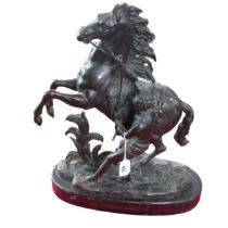 A 19th century bronzed figure of a 'Marley Horse', signed 'Coustou', after Guillaume Coustou, H41cm