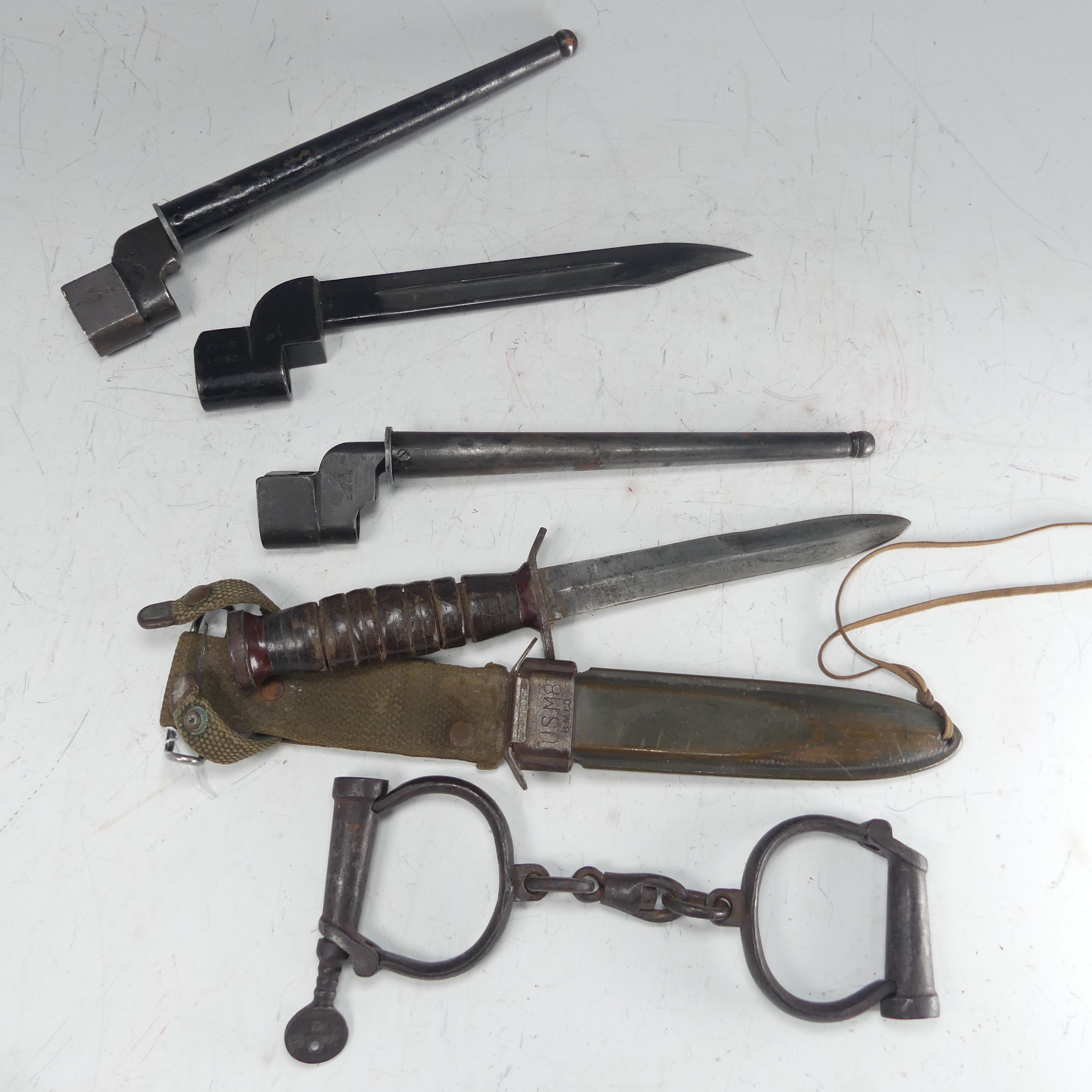 An American USM8 B.M.CO bayonet Knife, with scabbard and material fittings, together with three - Image 3 of 6