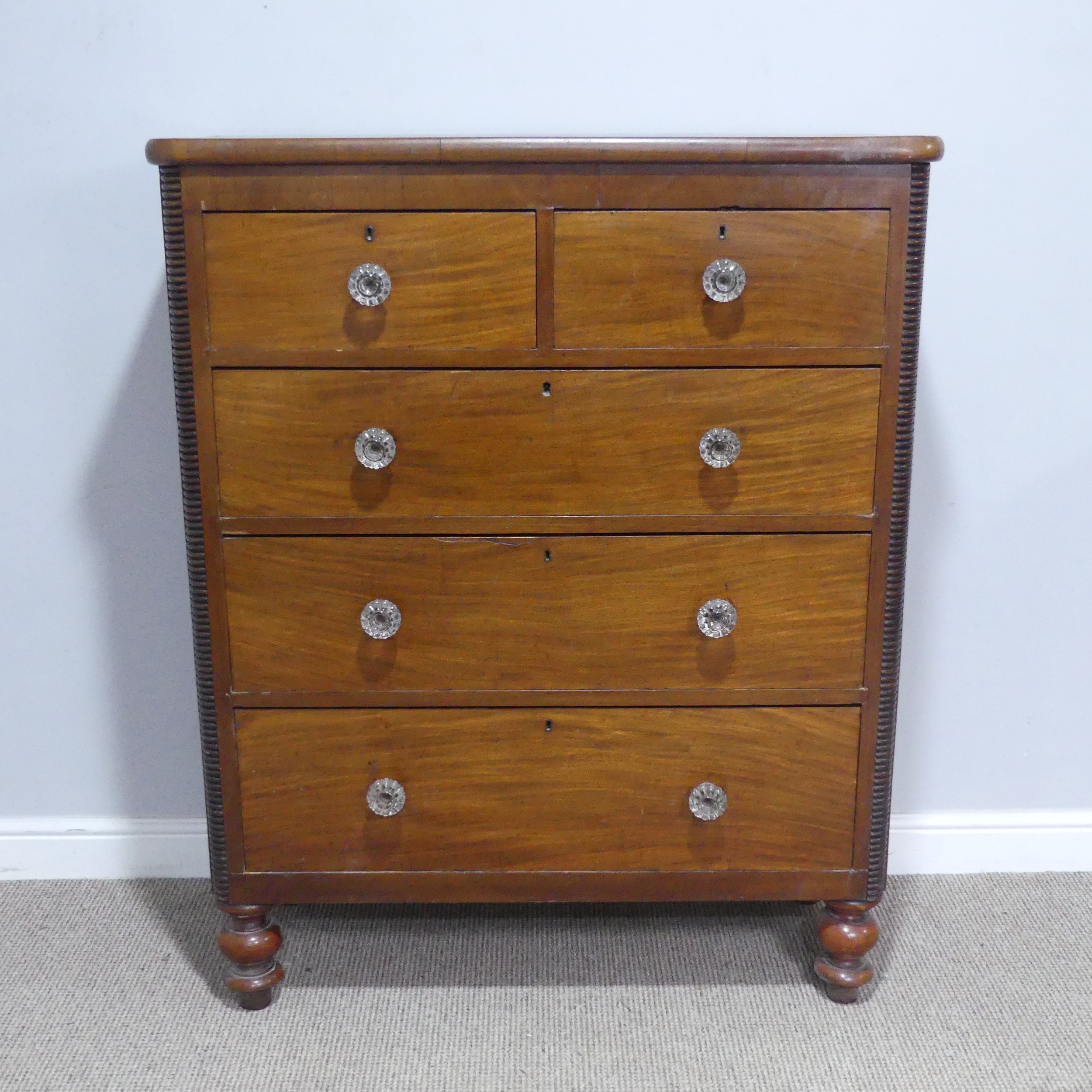 A Victorian stained pine and mahogany Chest of Drawers, with original glass handles, W 101 cm x H