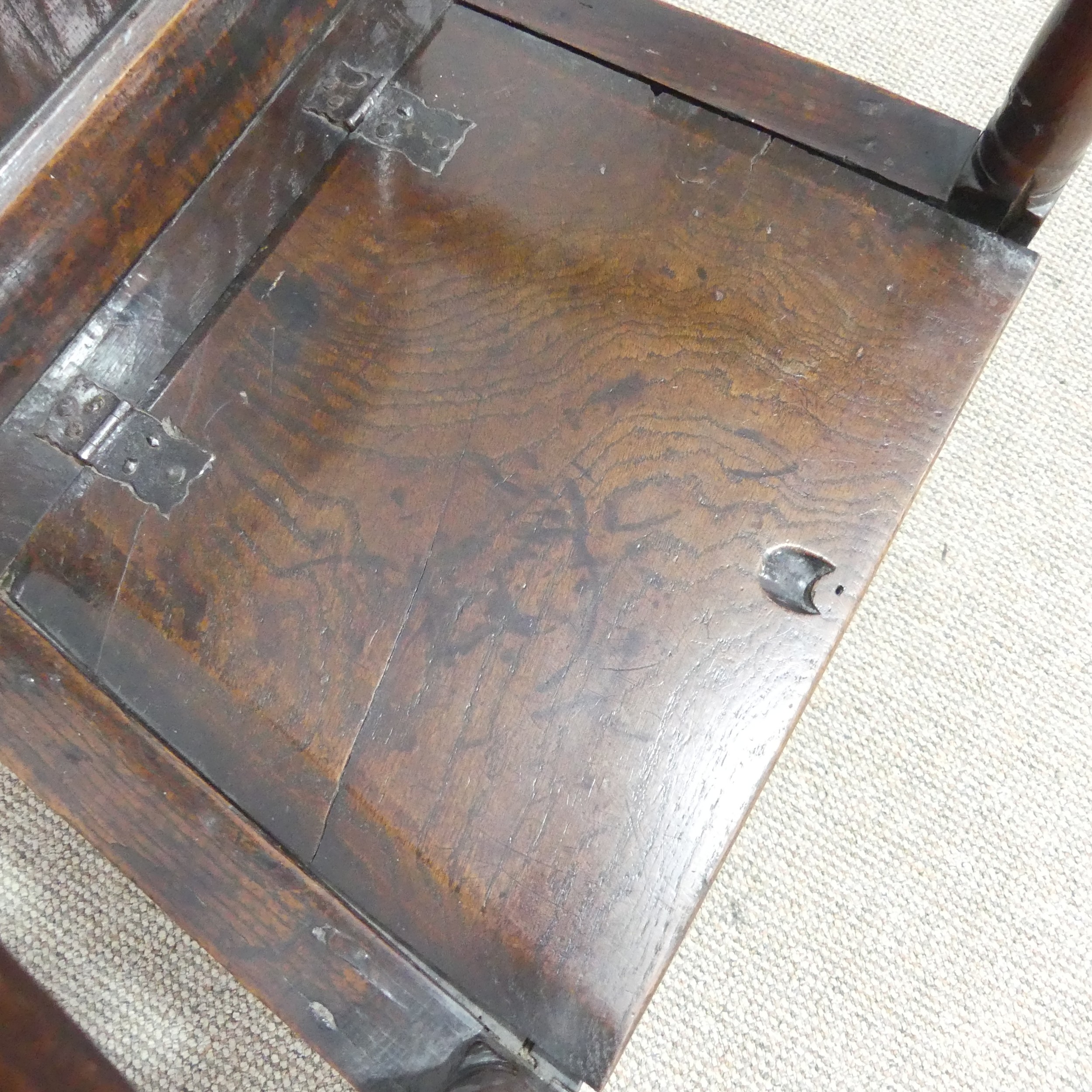 An antique probably 17th century oak wainscot box seat Armchair, carved backrest flanked by scrolled - Image 6 of 11