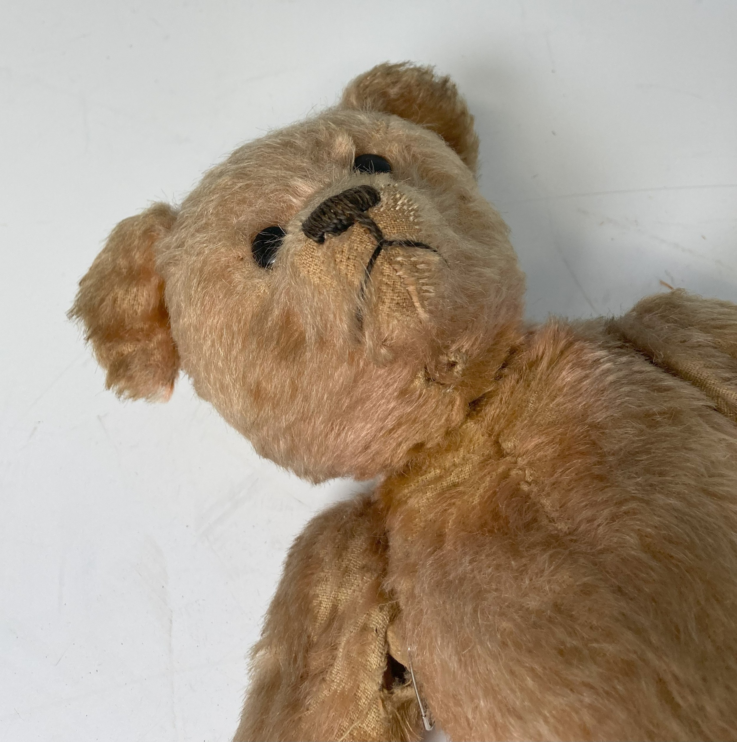 A vintage Teddy Bear, with black button eyes, straw filling, sewn nose, light orange plush and - Image 2 of 6