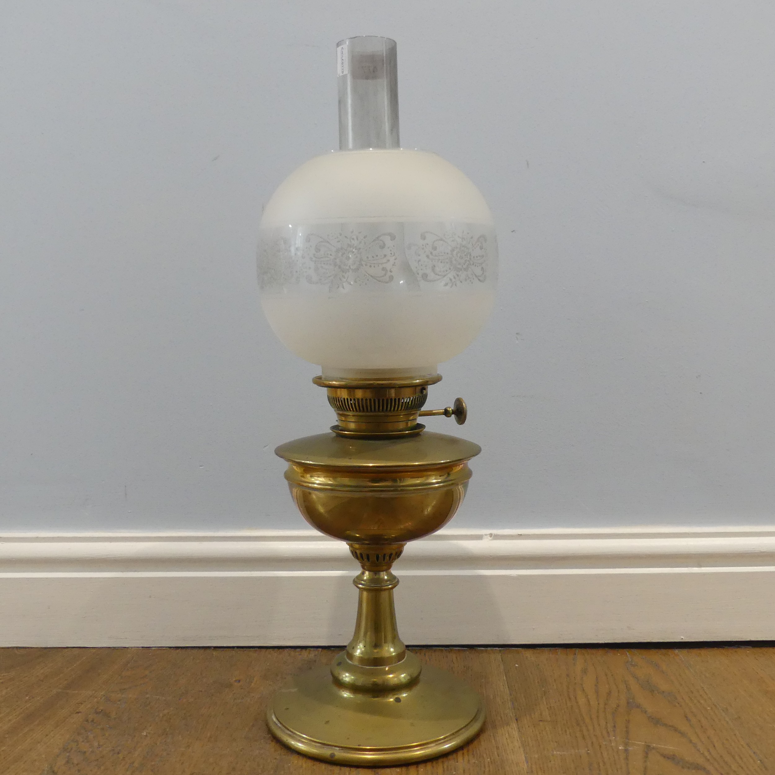 A Victorian brass Oil Lamp, stamped 'King & co, Hinks Hull', with etched glass shade and funnel, H