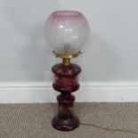 An antique ruby glass electrified Oil Lamp, with etched glass shade, H 49 cm, together with two