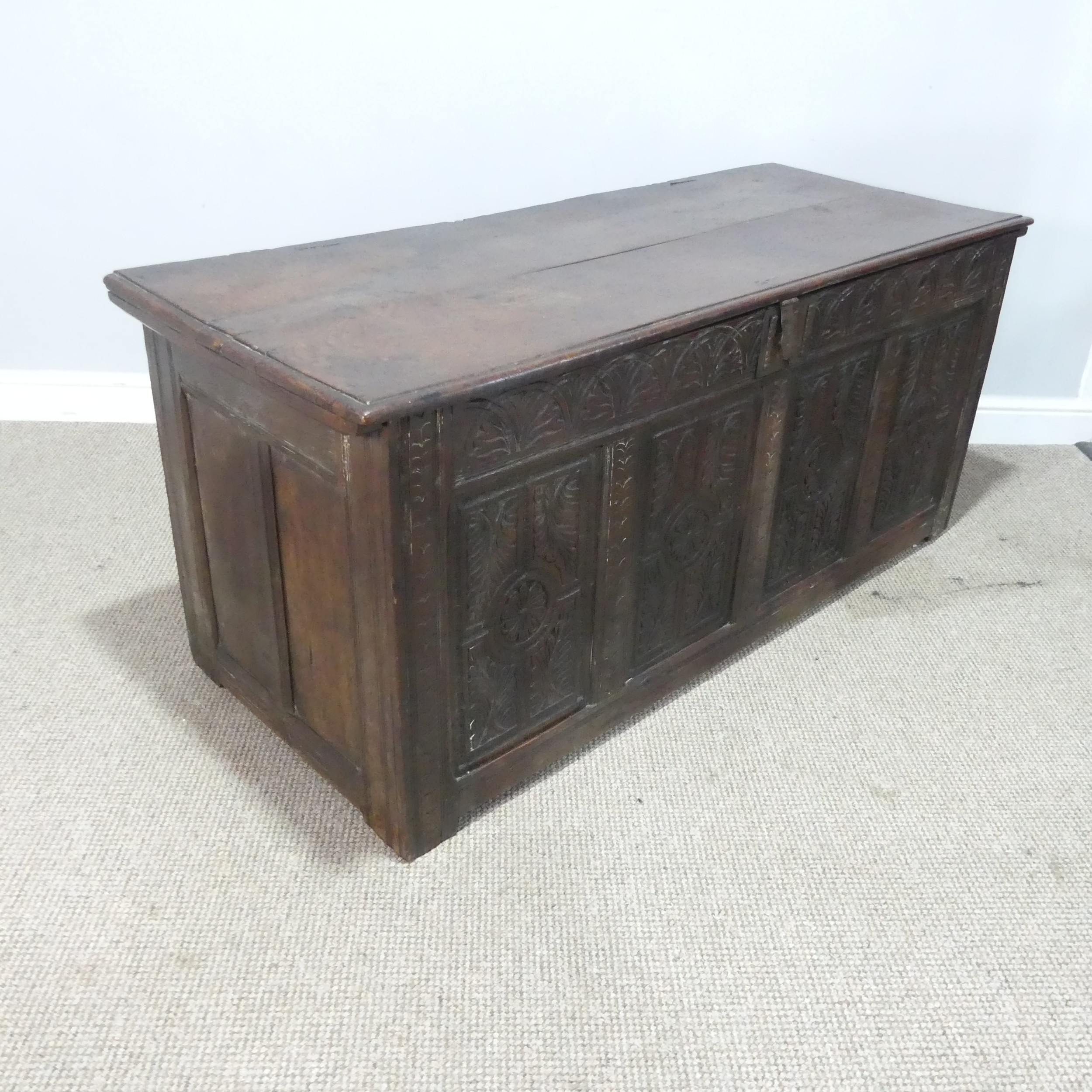 A 17th century and later oak Coffer, rectangular plank top over 17th century carved panels, raised - Bild 10 aus 11