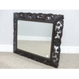 An antique carved and pierced oak rectangular wall Mirror, W 76 cm x H 62 cm.