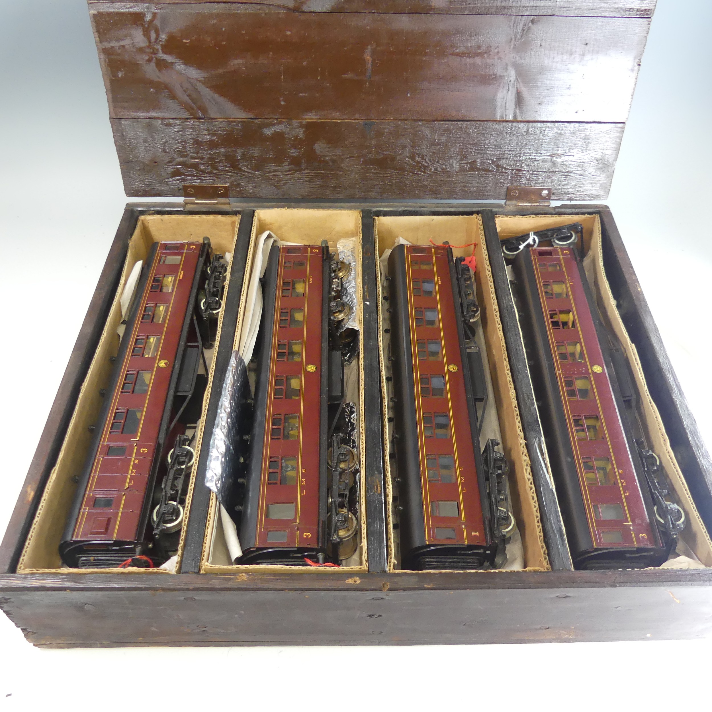 Four Leeds Model Co. ‘0’ gauge LMS bogie Passenger Coaches, maroon with yellow lettering, comprising