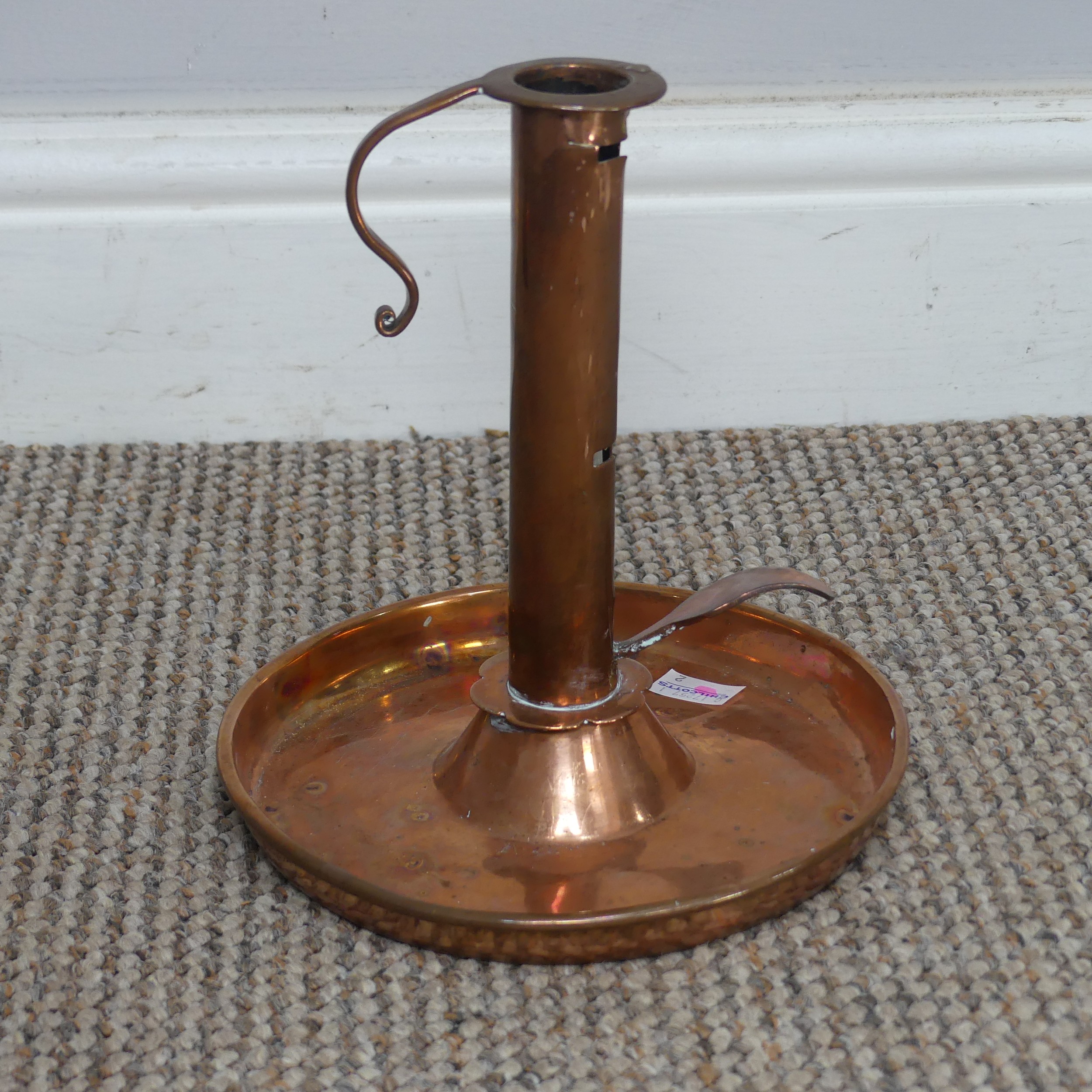 An antique copper Chamber Stick, H 19.5 cm.