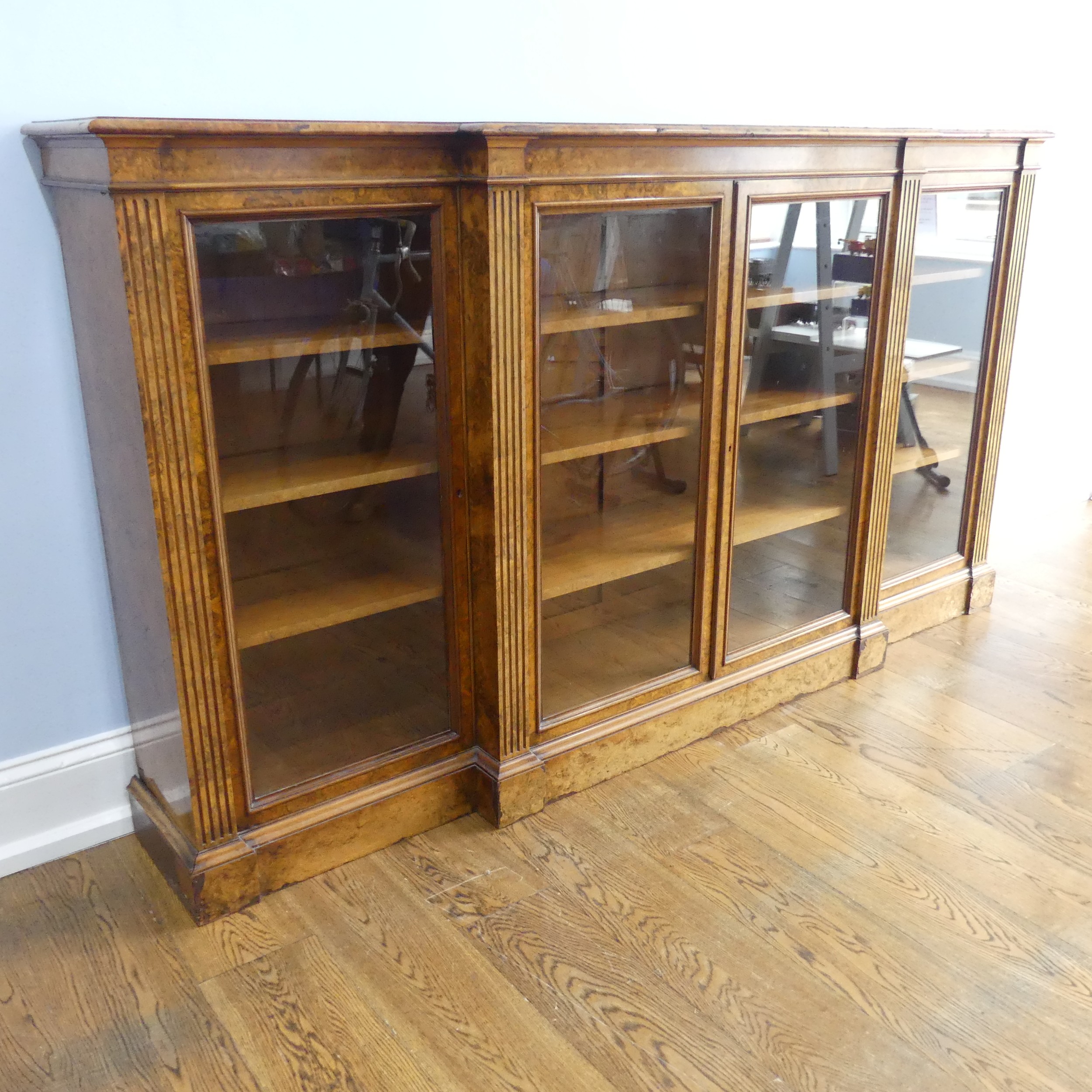 A good Victorian burr walnut breakfront glazed Bookcase, shaped top over glazed doors and plinth - Image 4 of 14