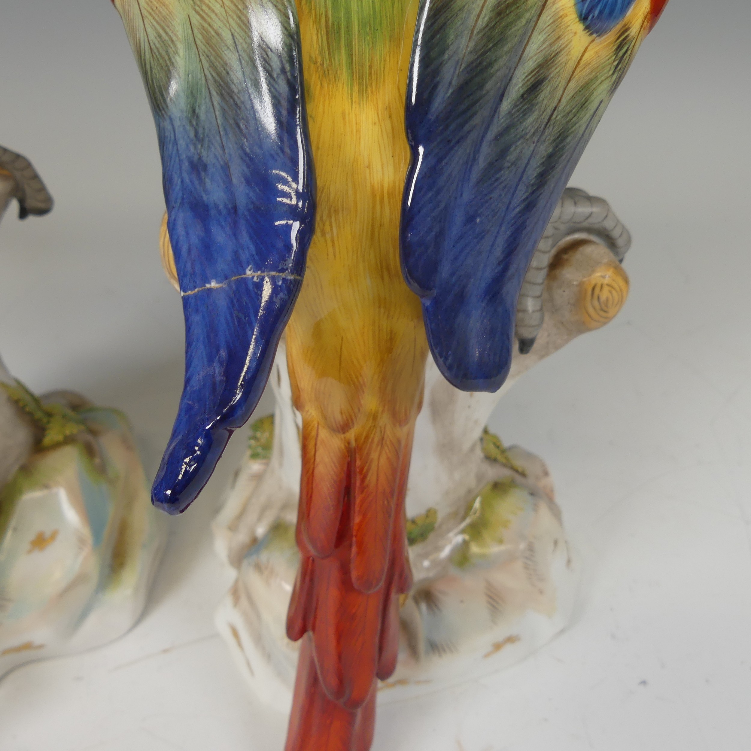 A pair of 20thC continental porcelain Parrots, modelled perched on a tree, underglaze blue mark to - Image 4 of 6